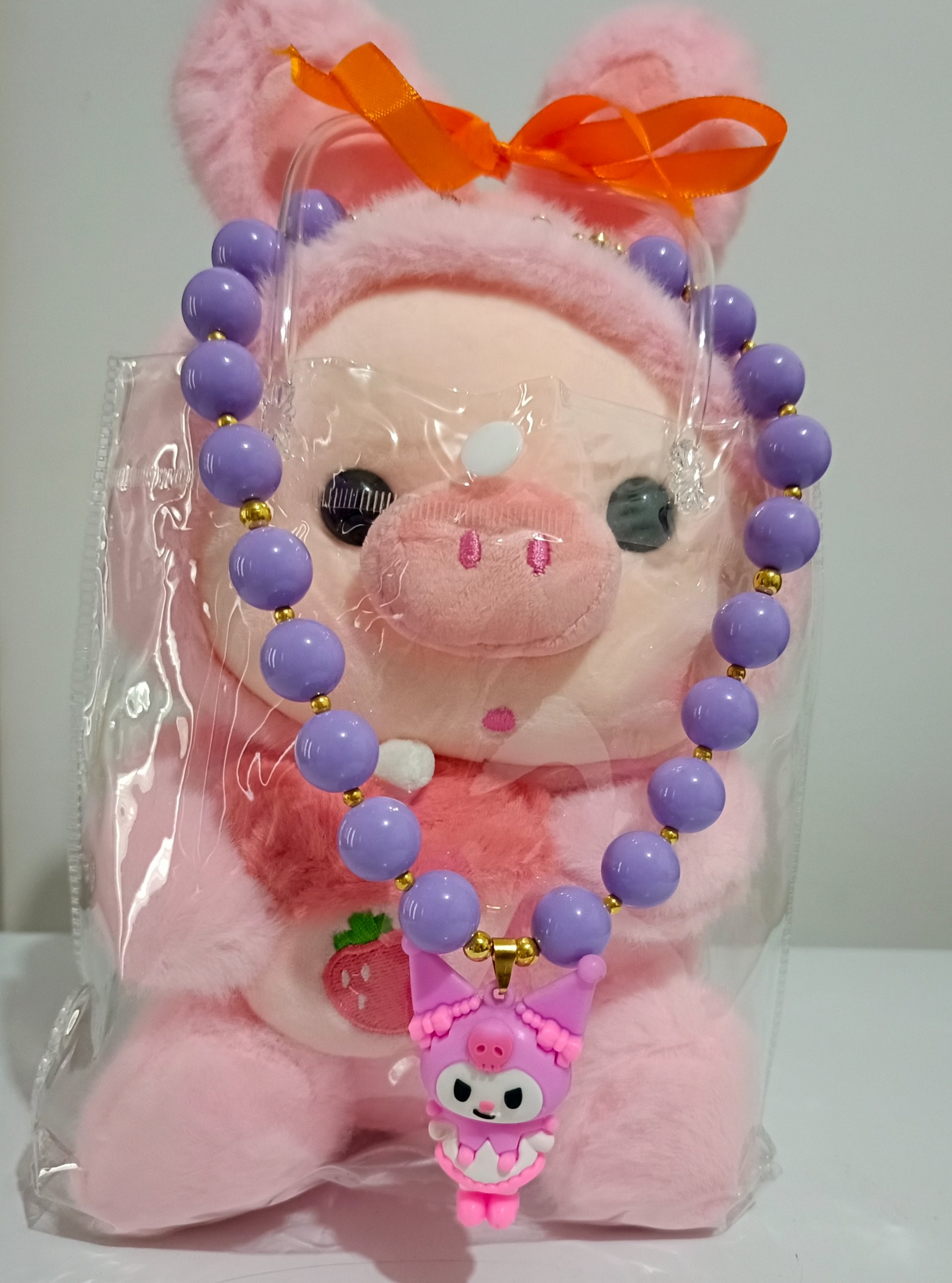 Peluche con collar de niña