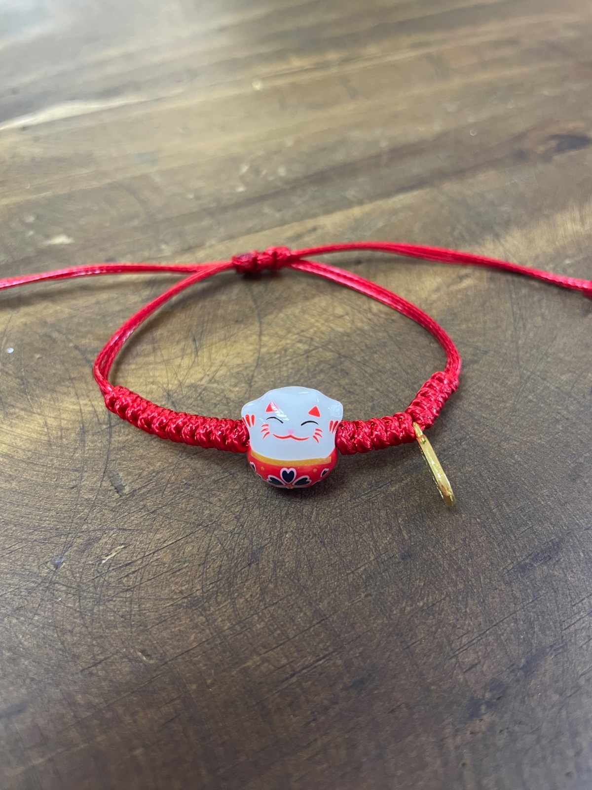 Pulsera gatito de la suerte hilo rojo