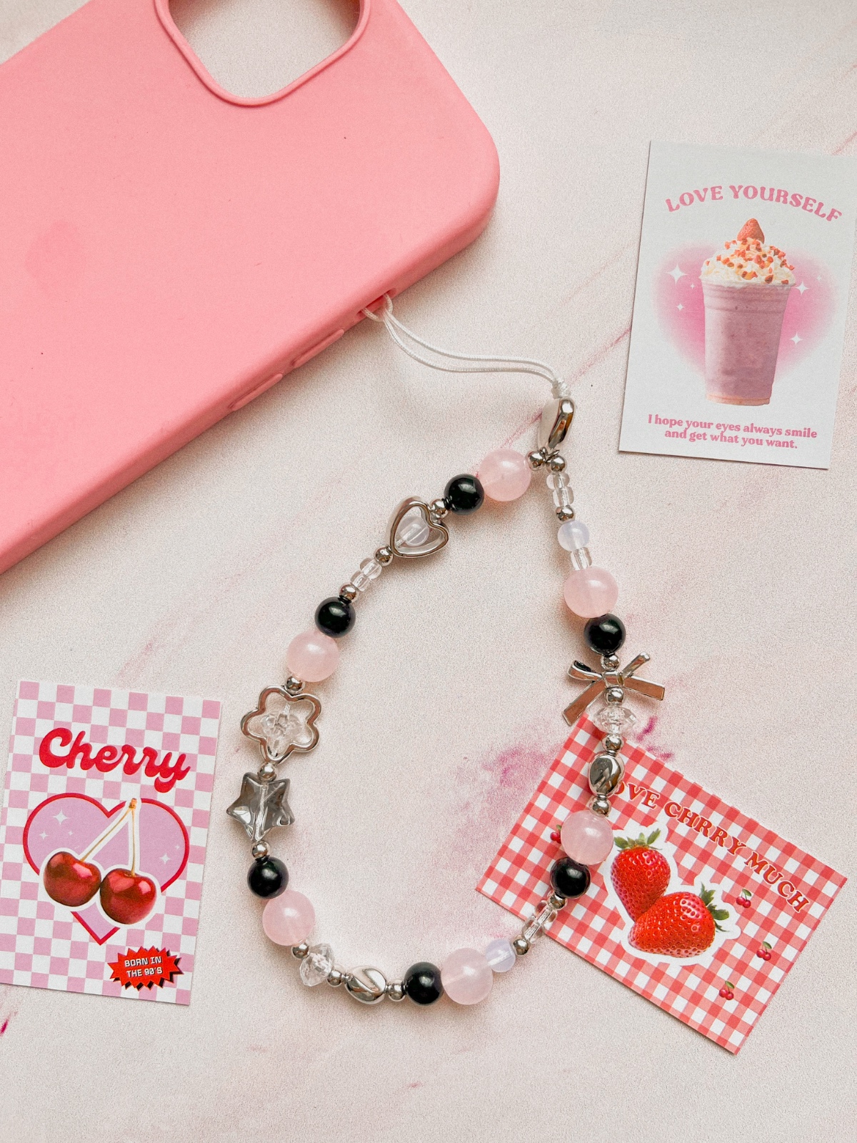 strap negro con rosado y plateado negro